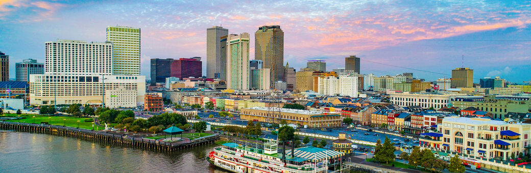 A waterfront city skyline of New Orleans, Louisiana.
