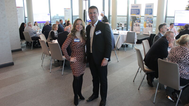 Employees posing together at Contractor Connection Top Performers Banquet