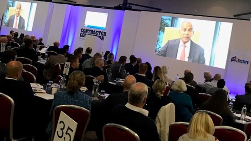 Delegates watching a video presentation from CEO and President, Harsha V Agadi, on the importance of our network partners to Crawford.