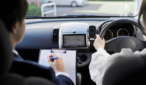 Woman taking a driving exam