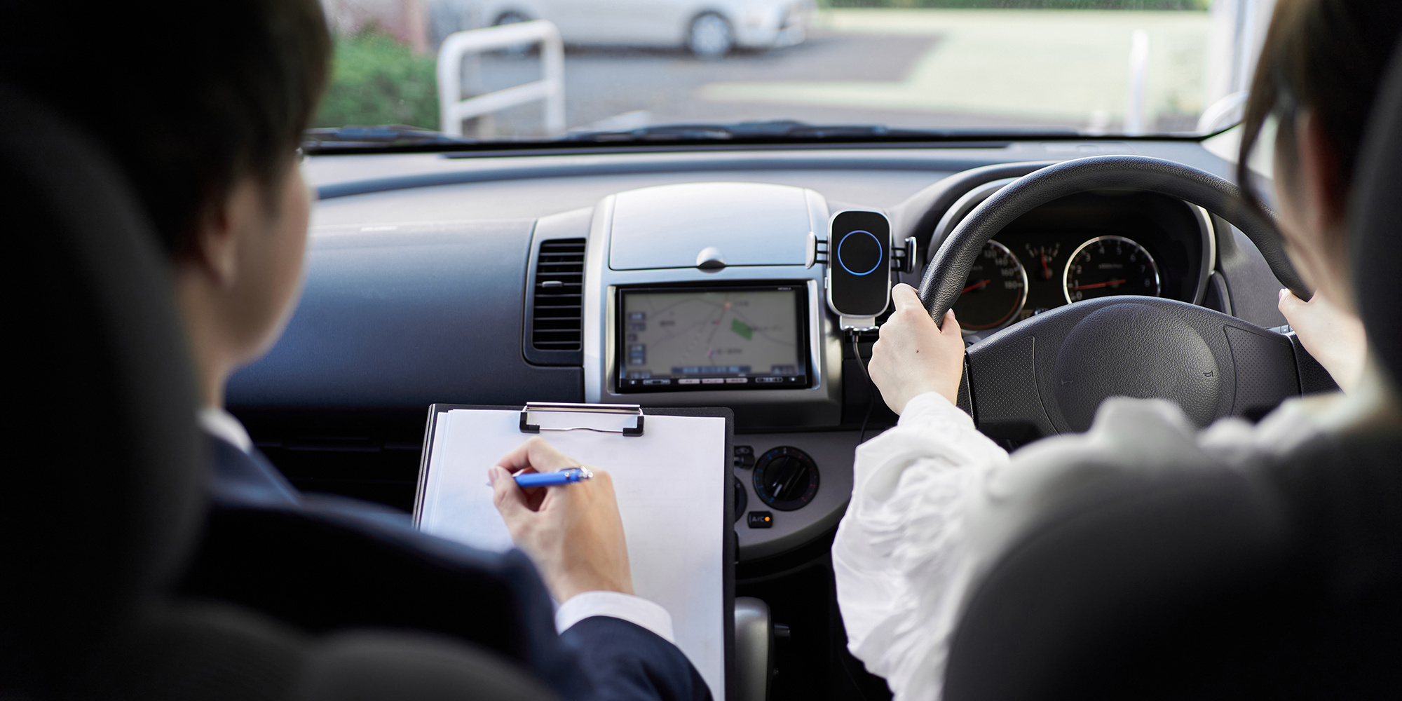 Woman taking a driving exam