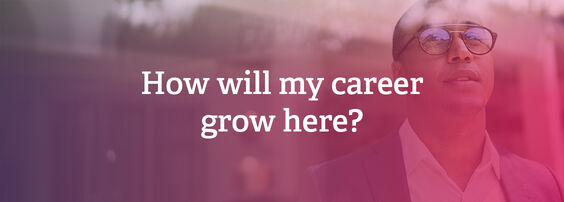 Person in a suit with glasses, looking up thoughtfully, overlaid with the text "How will my career grow here?