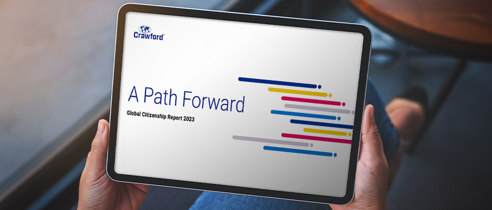 Image of the 2023 Global Corporate Citizenship Report on an ipad