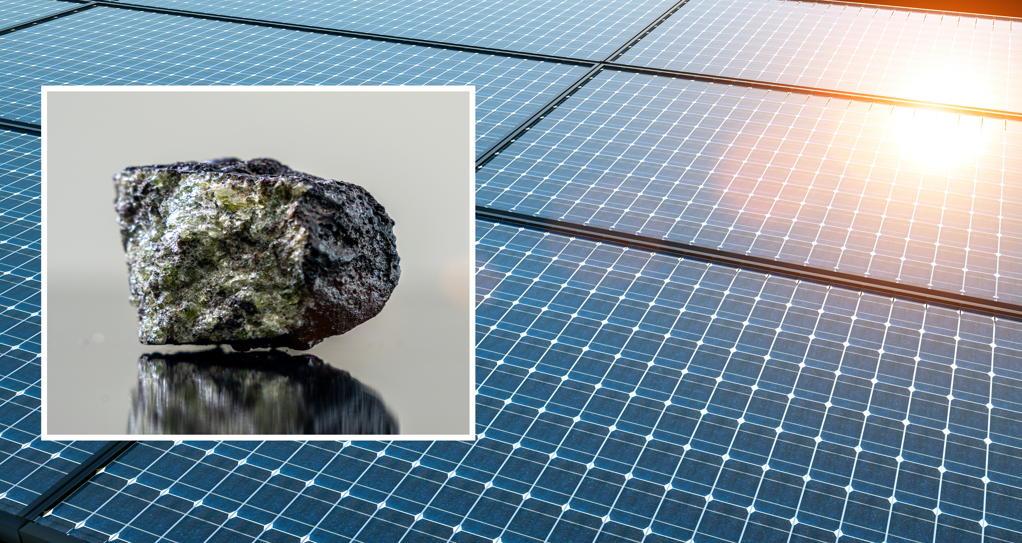 Perovskite mineral sample inset over solar panels, illustrating its role in emerging solar energy technology