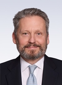 Headshot of Bruce Swain, President & CEO